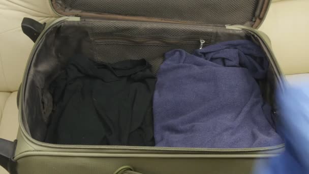 Suitcase with clothing - Video, Çekim