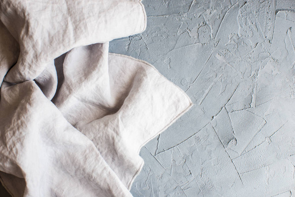 Kitchen towel or napkin over the rustic concrete table - Foto, imagen