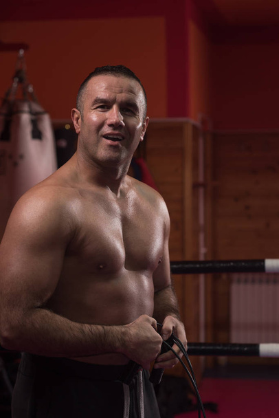 portrait of muscular professional kickboxer - Foto, Bild