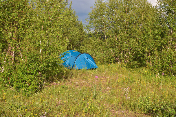 Tent in the glade.  - Fotó, kép