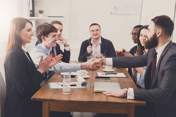 Business handshake at office meeting, contract conclusion - 写真・画像