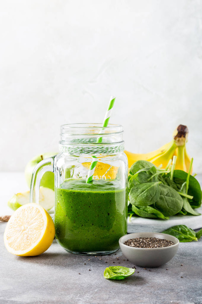 Healthy green smoothie with spinach in glass jar - Fotografie, Obrázek