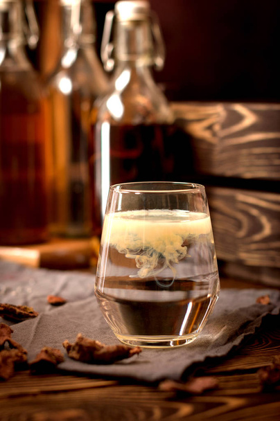 Tincture alcohol  propolis  herbs mixed glass water - Fotó, kép