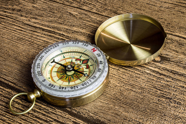 Old compass on wooden background - Zdjęcie, obraz