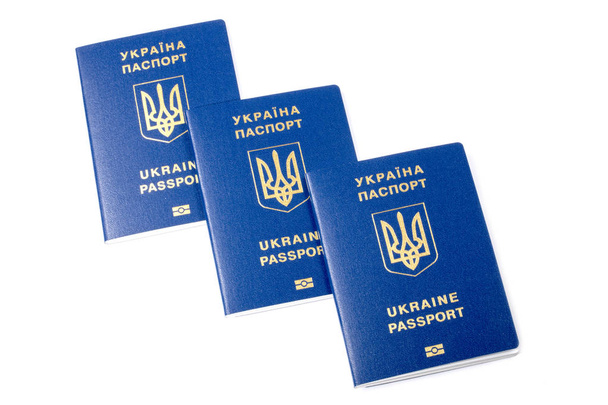 Ukrainan biometriset passit valkoisella pohjalla
 - Valokuva, kuva