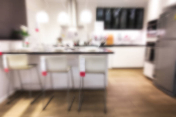 Abstract Blur background of modern kitchen furniture showroom - Photo, Image