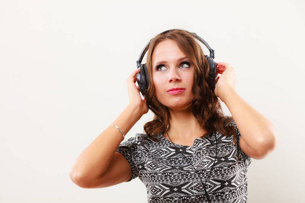 woman in headphones listening music mp3 relaxing - 写真・画像