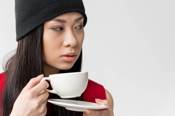 紅茶のカップでアジアの女性 - 写真・画像