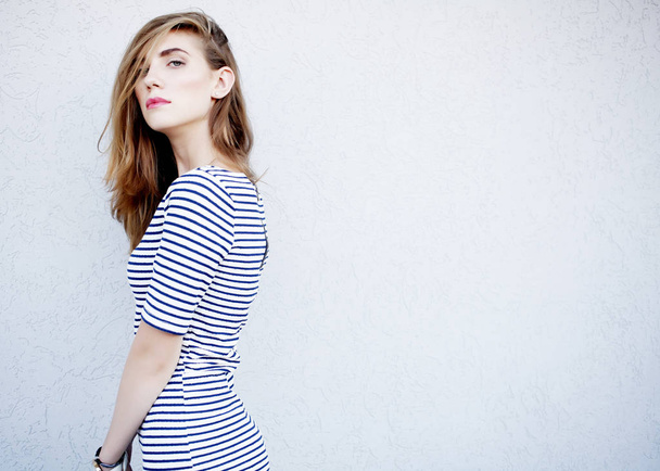 cute woman in striped dress - Фото, зображення