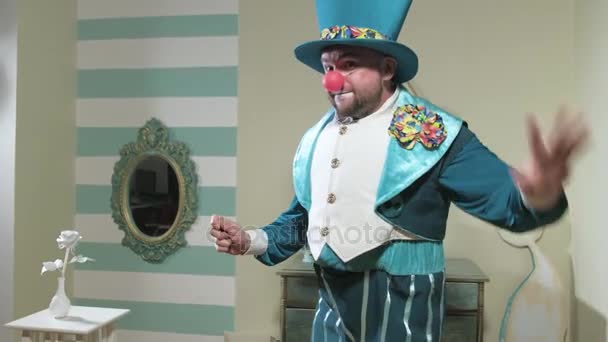 Magician in blue suit and hat manipulates waving a magic wand 4k - Footage, Video