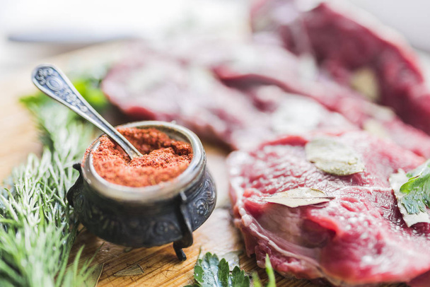 Fresh beef meat, dill and spices - 写真・画像