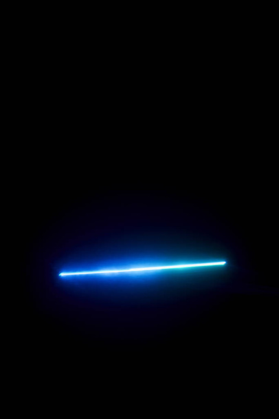 Laser beam blue on a black background  - Фото, зображення