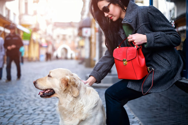 Long hair woman with dog  - Foto, Bild