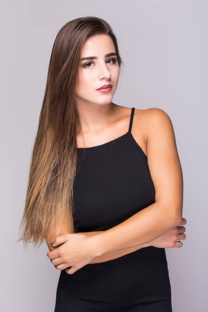 Portrait of beautiful woman in black dress ssolated on white - Photo, Image