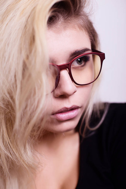 Portrait of blonde wearing glasses - Фото, изображение