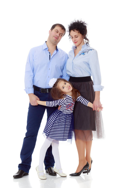 Happy parents with a small daughter. - Foto, Imagen