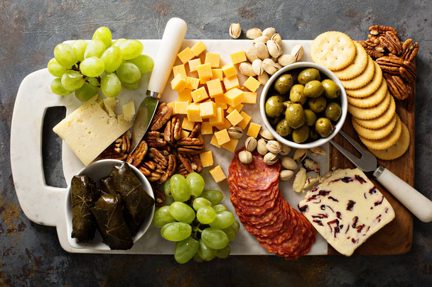 Cheese and snacks platter overhead shot - Foto, Imagem