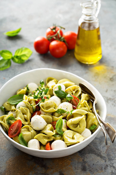 Italian pasta salad with spinach ricotta tortellini - Photo, image