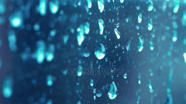 Film z krople deszczu na oknie w 4k - Materiał filmowy, wideo