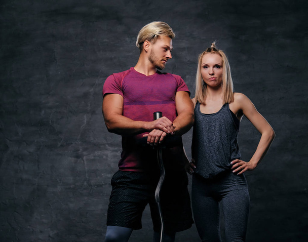 Sporty man and slim blond woman - Zdjęcie, obraz