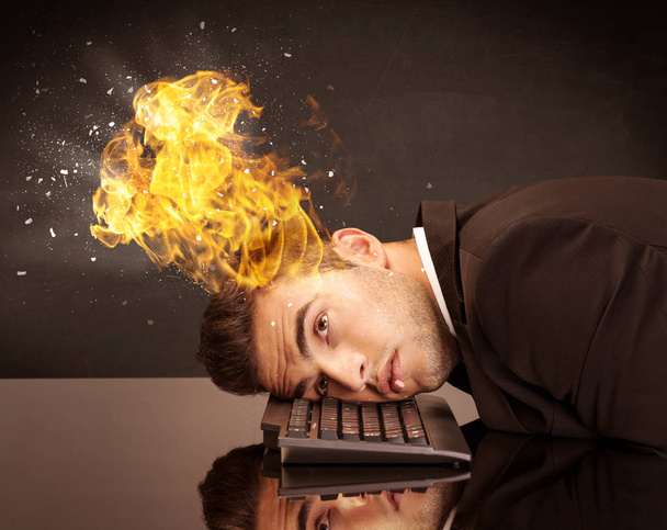 Stressed business man's head is burning - Fotografie, Obrázek