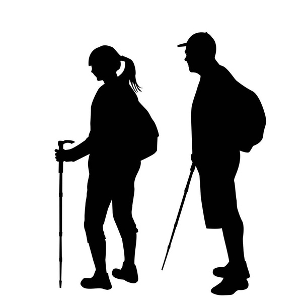Silhouetten van twee wandelaars met rugzakken  - Vector, afbeelding