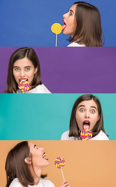young woman with the colorful lollipop at studio - Foto, immagini