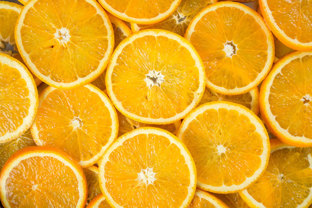 Pile of sliced oranges - Foto, Imagen