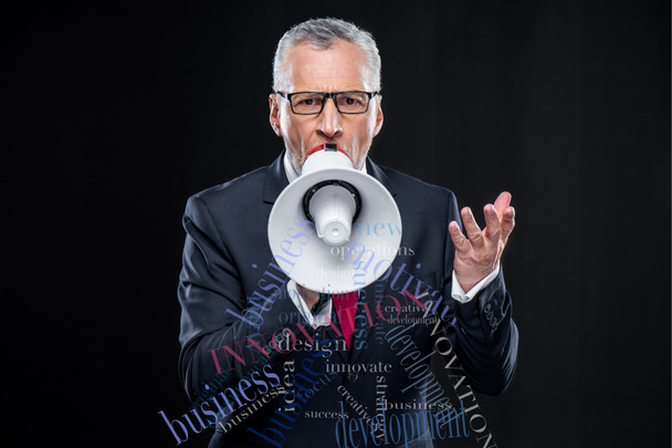 senior businessman with loudspeaker - Photo, Image