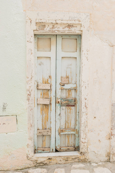 Traditional old painted door in a historical district or medina, Tunisia. - 写真・画像