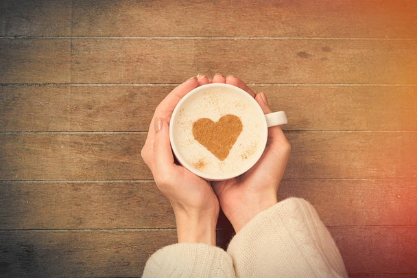 female hands holding cup of coffee - Photo, Image