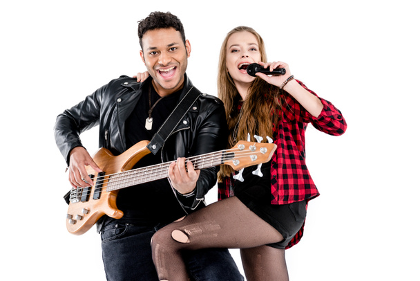 Couple with microphone and guitar  - Photo, Image