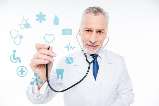 doctor with stethoscope and medical care icons - Photo, Image