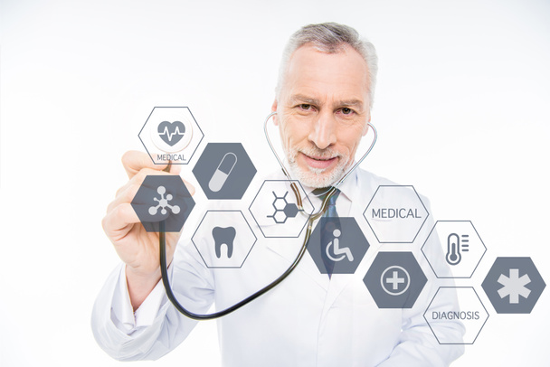 doctor with stethoscope and medical care icons - Photo, Image