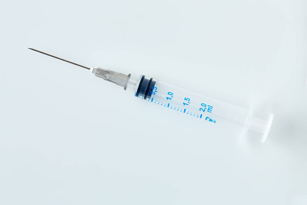 Disposable syringe isolated on white background. - Photo, Image