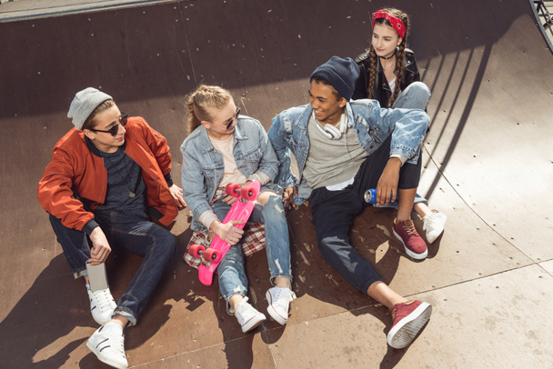 teenagers posing in skateboard park  - Valokuva, kuva