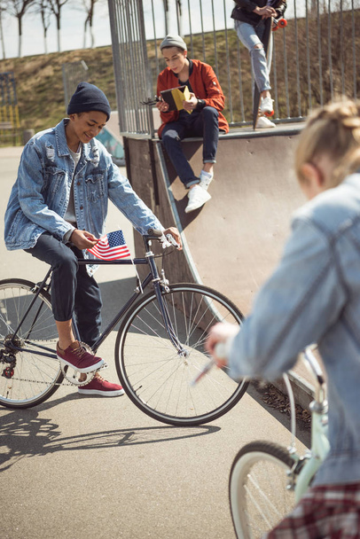 teenagers riding bicycles - 写真・画像