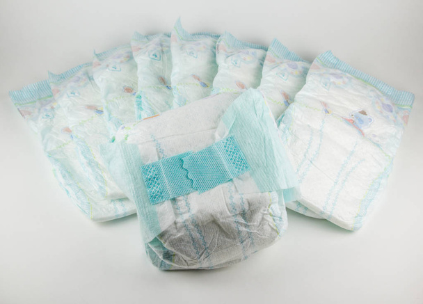 Baby diapers on a white background - Foto, Imagen