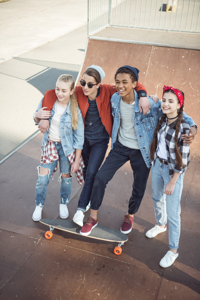 teenagers spending time at skateboard park - 写真・画像