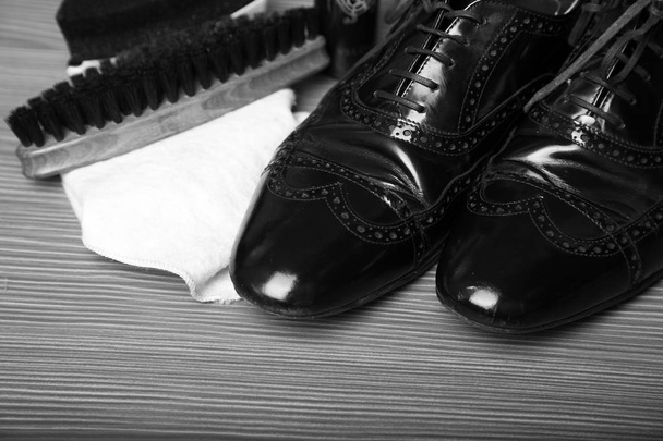Black men's shoes with care accessories. Gentleman accessories. Man's style - Foto, immagini