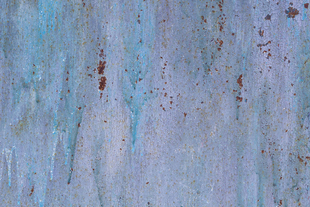 Іржава пофарбована металева стіна корозія зі смугами іржі
 - Фото, зображення