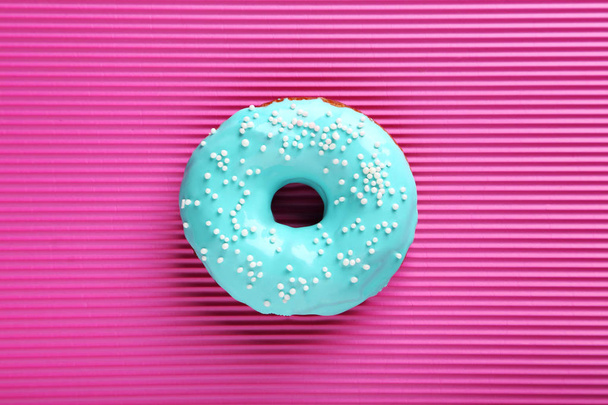 Tasty donut with sprinkles - Фото, изображение