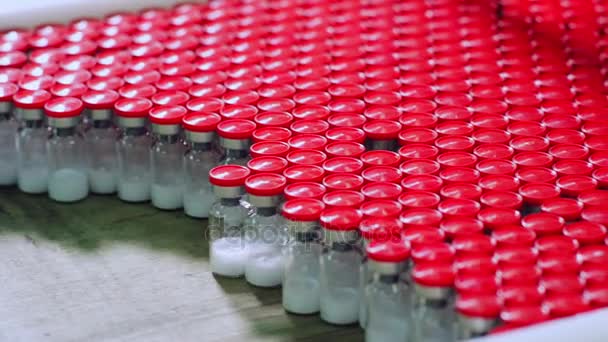 Ligne de production de bouteilles de médicaments à l'usine pharmaceutique. Flacons médicaux
 - Séquence, vidéo