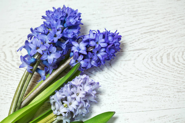 Blue hyacinth on old wooden background - Photo, Image