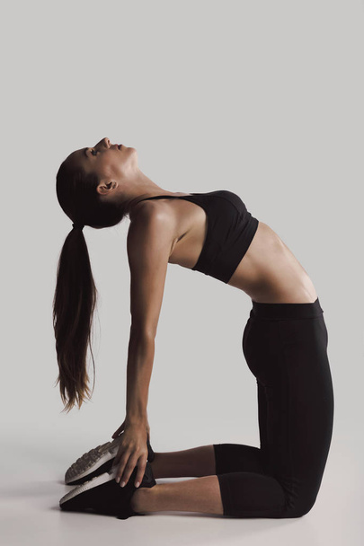 woman doing stretching exercises  - Fotografie, Obrázek