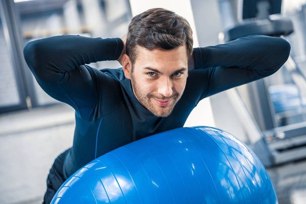 man exercising on fitness ball  - Fotó, kép