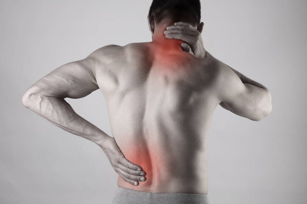 Sport injury, Man with back, neck pain. Pain relief and health c - Фото, изображение