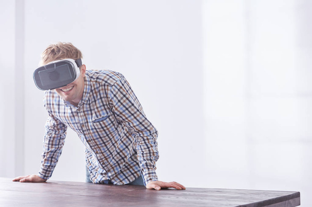 Casual worker using vr goggles - Foto, Imagen