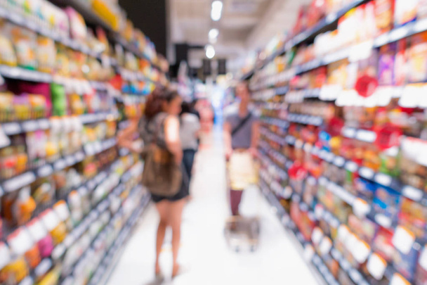 Supermarket interior and storage shelf on blur scene. - Fotó, kép