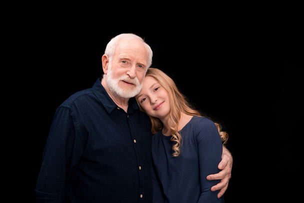 grandfather and granddaughter hugging - Фото, зображення
